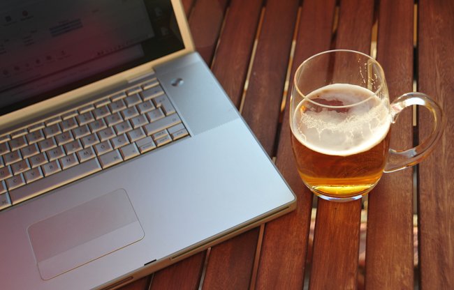 laptop and mug of beer